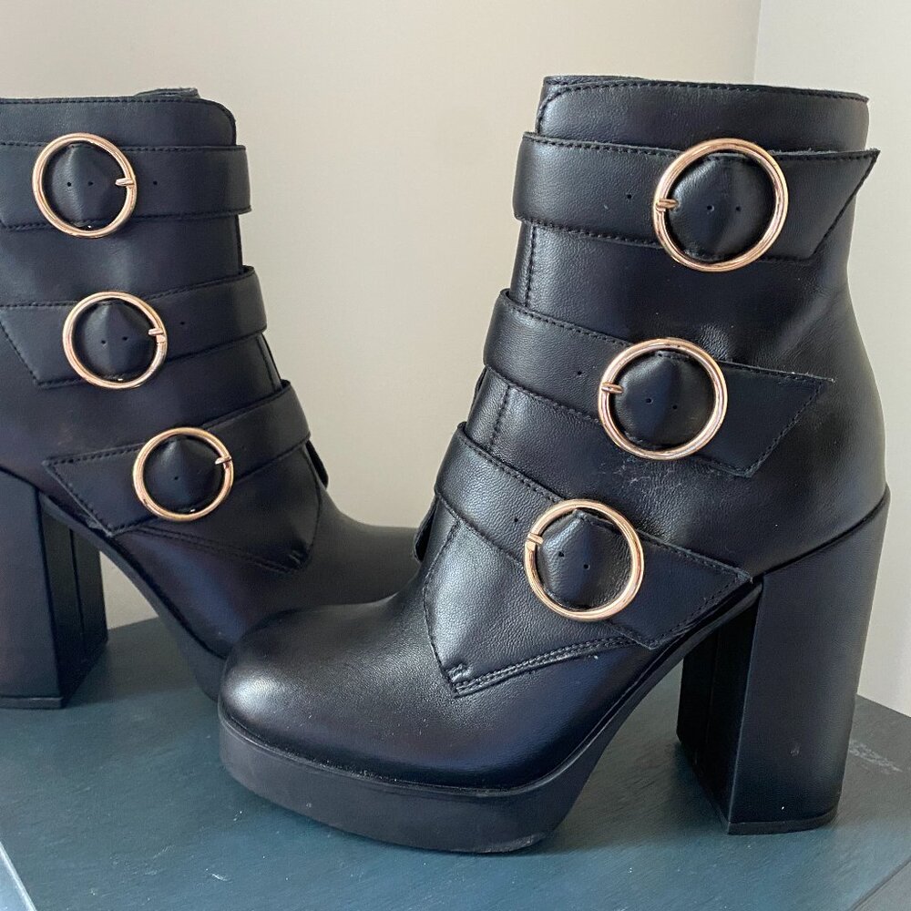 Steve Madden platform booties with buckle adornment, size 8.5